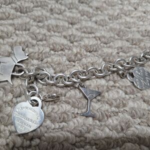 Tiffany & Co. Silver Charm Bracelet with rare charms.